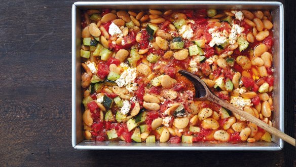 Baked beans with tomato, zucchini and feta.