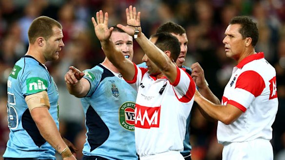 The fallout: Trent Merrin feels the referee's wrath.