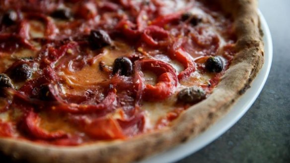 Thin and crisp: The diavola pizza with mozzarella fiordilatte, salami, capsicum and olives.