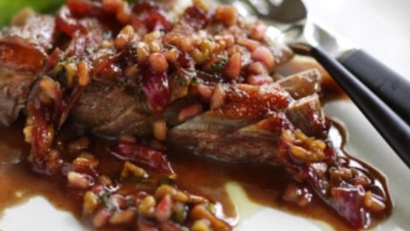 Warm duck salad with sweet and sour pomegranate sauce