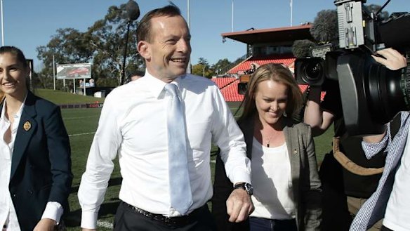 Opposition leader Tony Abbott and Liberal candidate Fiona Scott in Penrith, NSW, on Tuesday.