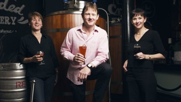 Redoak brewer David Hollyoak with sisters Janet and Helen at their pub in Sydney's CBD.