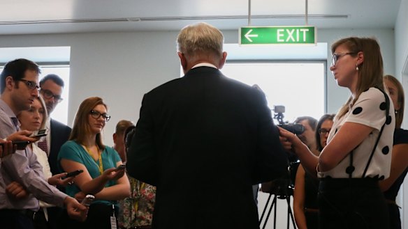 Outgoing Trade Minister Andrew Robb addresses the media following his retirement announcement
