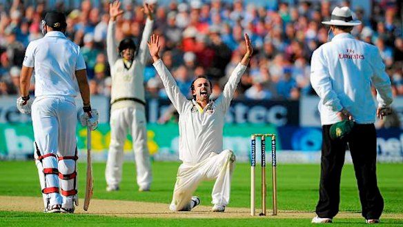 Scalp number four: Nathan Lyon successfully appeals for an lbw decision against Jonny Bairstow.