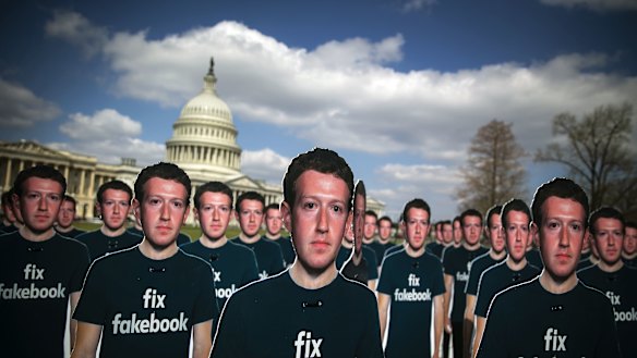 Cutouts of Facebook CEO Mark Zuckerberg are displayed on the South East lawn of the Capitol building ahead of testimony before a joint hearing of the Senate Judiciary and Commerce Committees in Washington, DC.