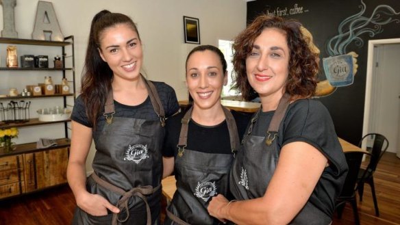 Alessandra Canilho (centre) with sister Isabella (left) and mother Gina.