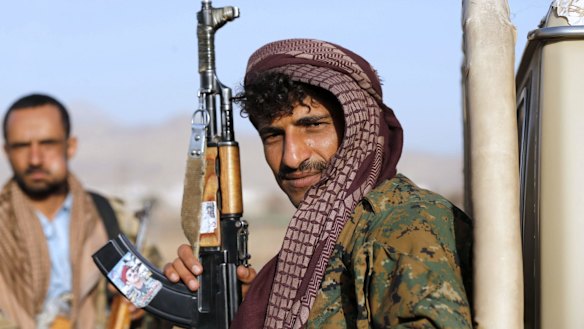A Houthi fighter near the presidential palace in Sanaa on Thursday.