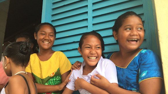 Tuvaluan girls outside church.
