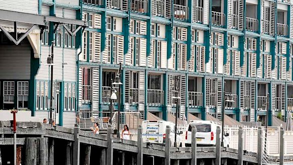 The scene outside Charlotte Dawson's apartment in Woolloomooloo on Saturday.