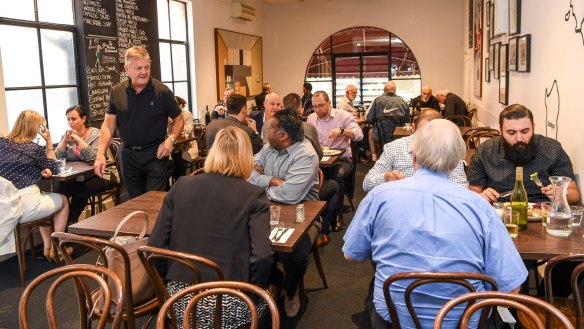 Denis Sabbadini (standing) is the second-generation owner of the Waiters Restaurant.