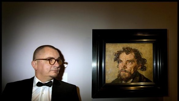Lawyer Olaf Ossmann with <i>Head of a Man</i>, which his clients are convinced is the work of Vincent van Gogh, at the National Gallery of Victoria where the painting has been returned to display.