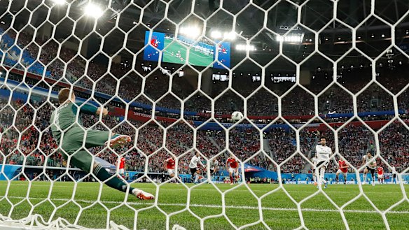 Lifeline: Salah beats Akinfeev from the penalty spot.