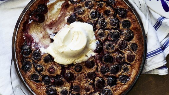 Baked oatmeal pudding, with cherries and yoghurt.