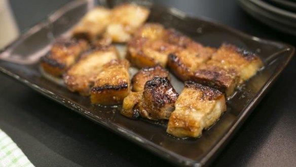 Grilled pork belly at Wasshoi Yakitori Bar.