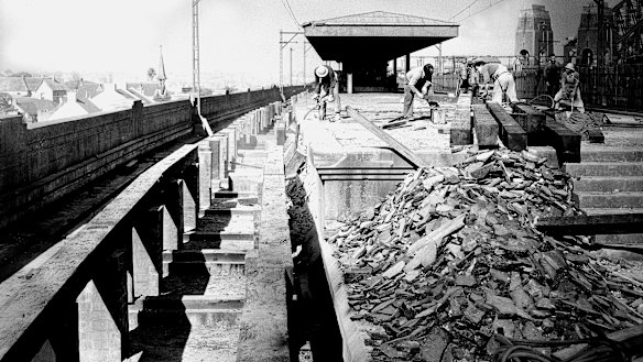 The Milsons Point tram station is demolished by workmen on 10 July 1958. 