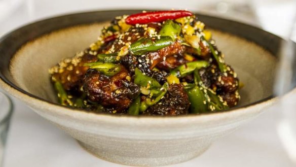 Smoky, sweet, salty and sticky: Pork ribs with jackfruit and pickled green chilli.