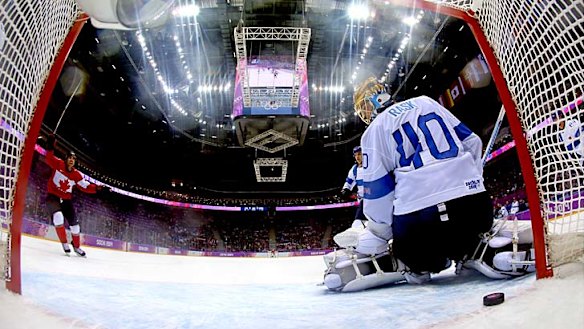 Drew Doughty sneaks the game-winner past Tuukka Rask.
