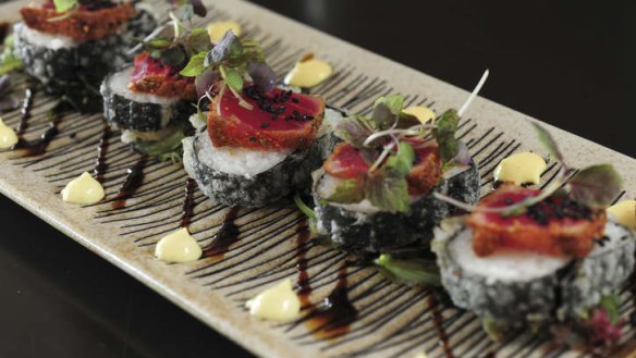 Tuna futomaki, seaweed salad, sweet soy and wasabi emulsion.