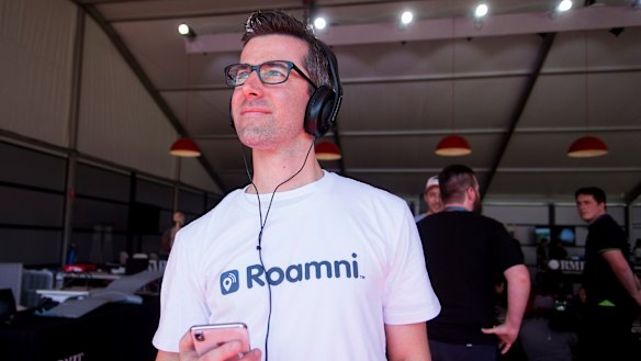 Greg Curcio showcasing the Roamni app at the Grand Prix. 