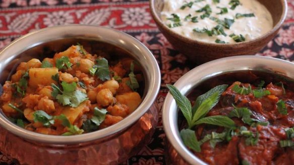 Aloo chole (chickpea and potato curry), left.