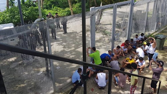 Refugees at the Manus Island regional processing centre protesting earlier this month. 