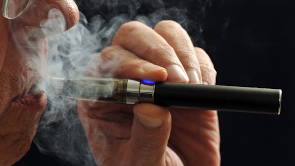 Vaping from an e-cigarette.