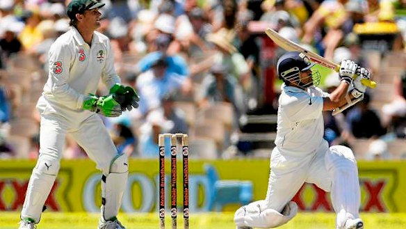 Sachin Tendulkar slogs sweep to the boundary.