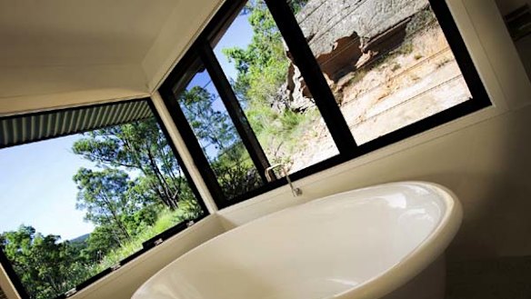Scrub in the scrub ... the epic bathroom includes an oval-shaped bath tub.