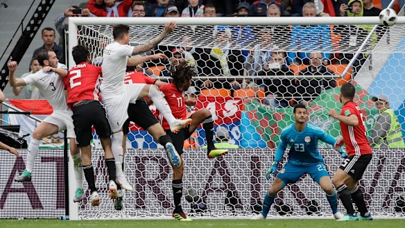 Jose Gimenez scores Uruguay's winner during the group A match against Egypt.