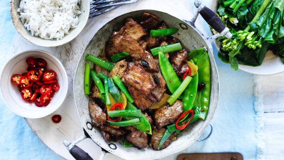 Stir-fried lamb with snow peas, black beans and chilli. 