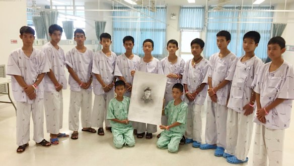 The 12 boys were only told of the navy SEALs death on Saturday. 