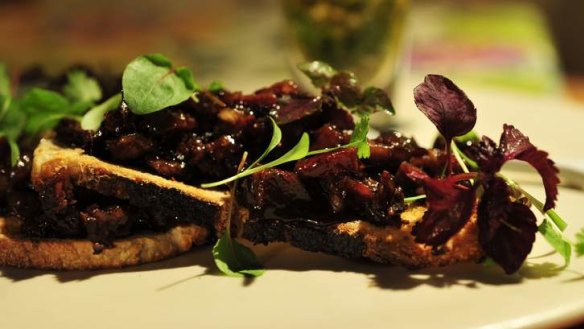 Short-rib crostini is deliciously oily.