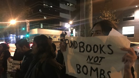 Students gather outside the ABC building in protest.