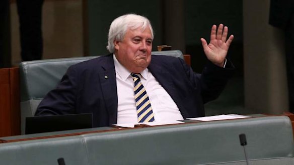 Clive Palmer switched seats during a division in question time. Photo: Andrew Meares