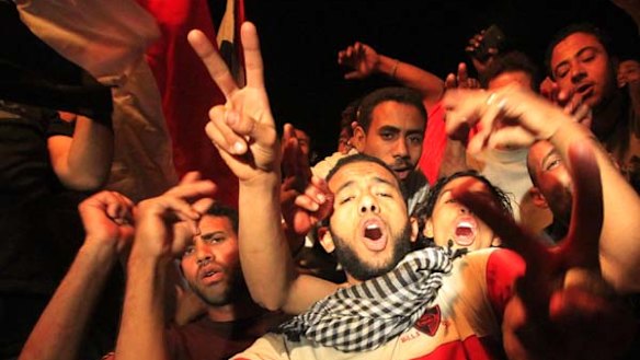 Egyptian residents celebrate the resignation of President Hosni Mubarak