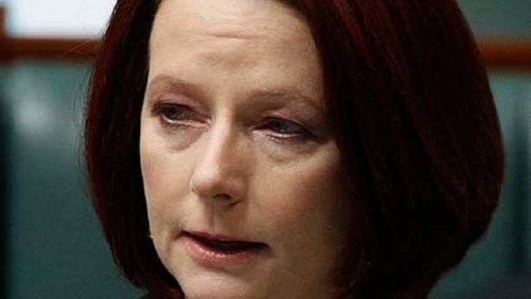 Emotional ... Julia Gillard addresses parliament on the human cost of the floods.