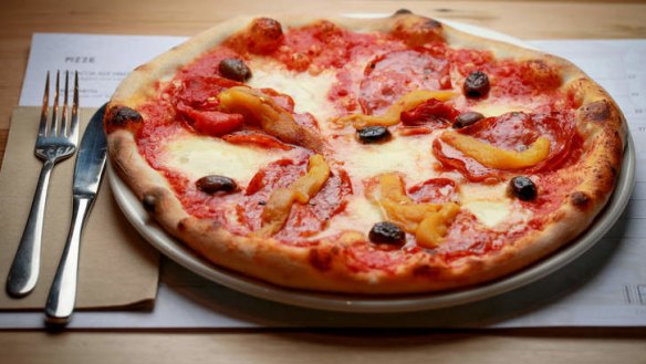 Diavola pizza with spicy salami, capsicum and olives.