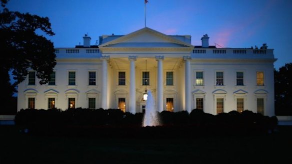 The White House at dusk: President Barack Obama has set out a broad long-term strategy to defeat the Islamic State.