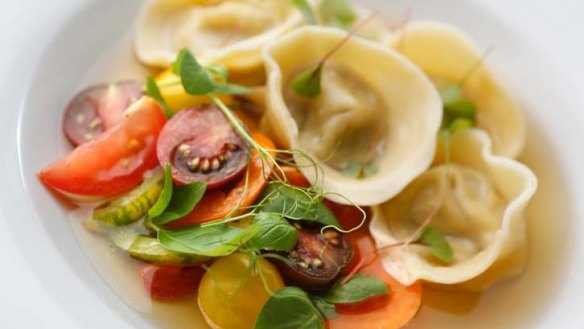 Tortellini with celeriac, basil and confit tomatoes.