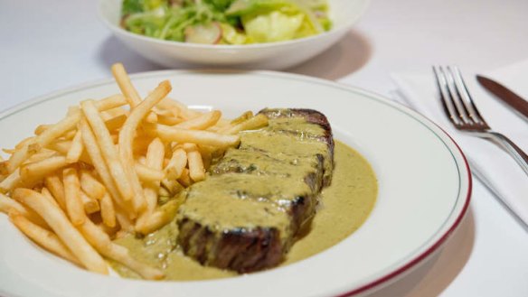 Signature dish: Steak, green salad with dijon vinaigrette and bottomless fries.