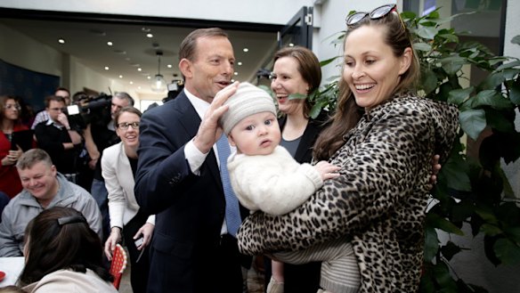 Suits us: Amelia Taylor and baby Thomas would benefit from Mr Abbott’s plan.