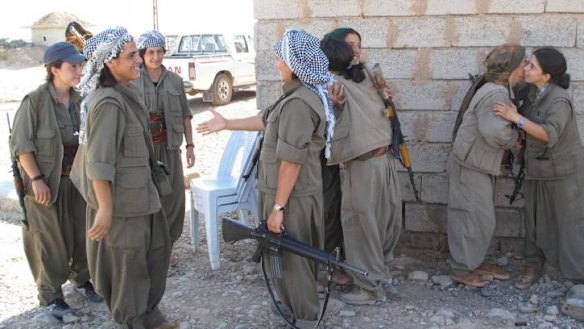 PKK fighters at the Daquq PKK base after a night gathering intelligence on the frontline.