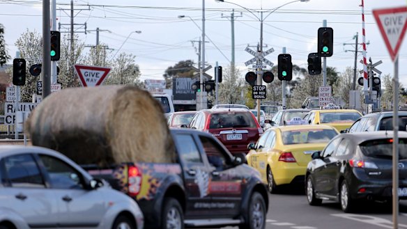 Traffic banks up at the intersection of Old Geelong Road and the Princes Highway in Hoppers Crossing.
