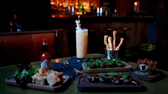 Enjoy the show and the food at Golden Age Cinema & Bar.