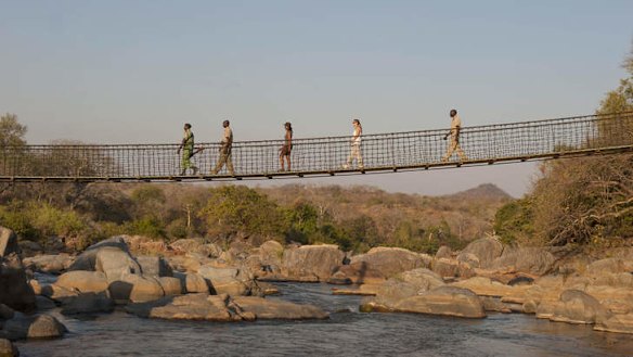 Access to the Mkulumadzi Lodge is by a swing bridge.