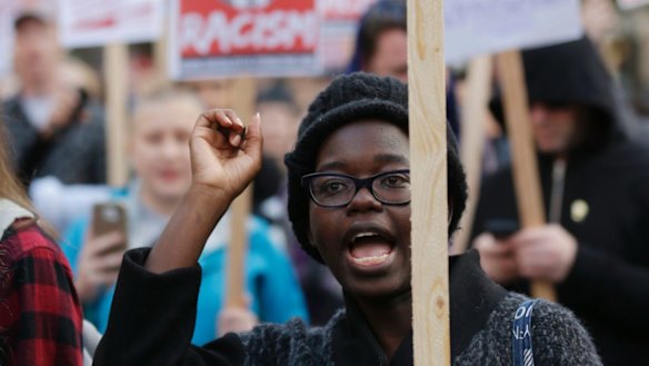 Santa Anigo chants in a protest in downtown Seattle. 