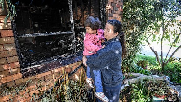 Thalia Bhandari with her daughter Alcina, 4, at their unit that caught fire in View Road, Springvale. 