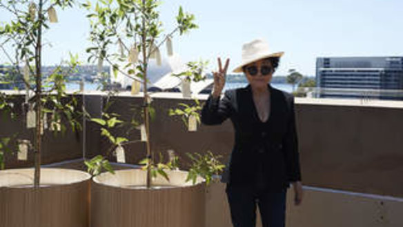 High hopes: Yoko Ono an enigmatic presence at the MCA installation, stands next to her Wish Tree.