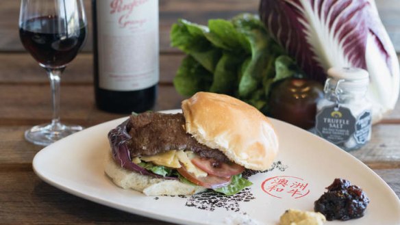 Emperor's Cut wagyu beef sandwich with a glass of Grange.