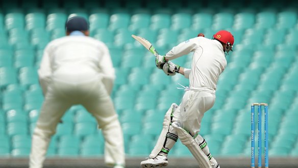 Phil Hughes is struck by Sean Abbott's bouncer at the SCG.